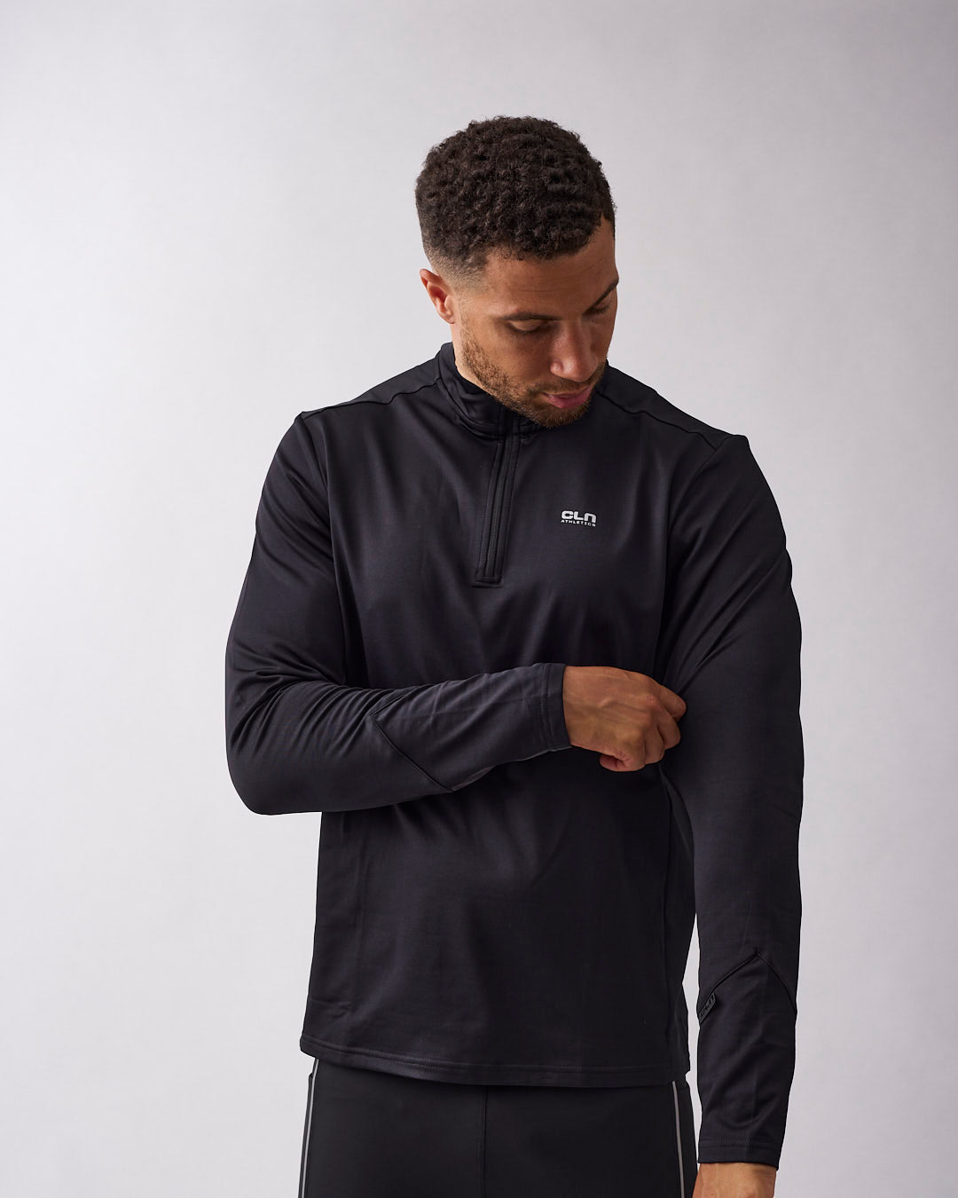 Ray 1/2 zip Black